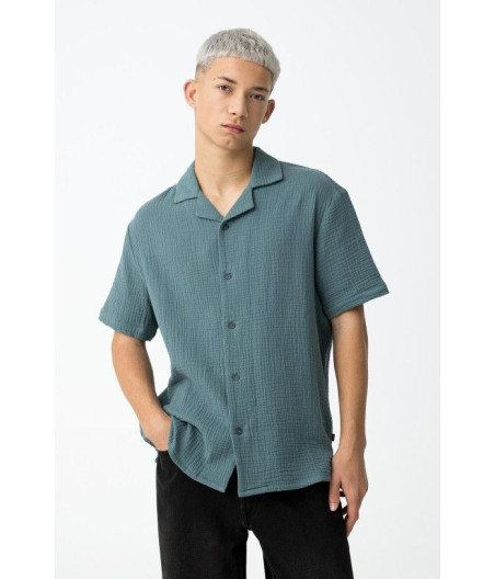 Camisa e pantalón